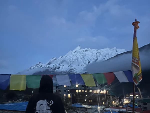 Mount Manaslu view in the evening with surrounded light and prayer flag and Tibetan banner